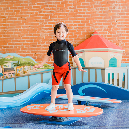 child play surfing